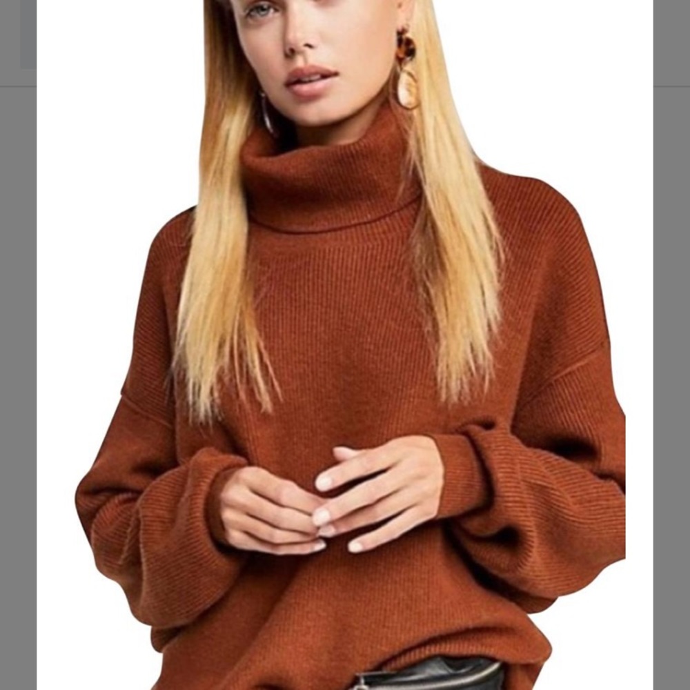 Free people softly structured knit tunic.